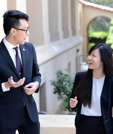 Business, two students talking Business, two students talking